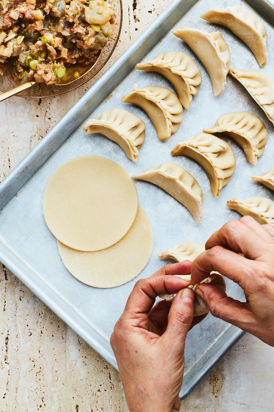 If there are dumplings being made during Lunar New Year, it must be midnight.