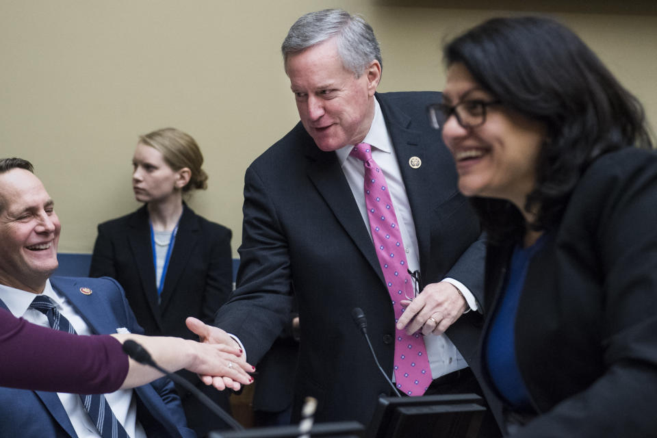 Reps. Mark Meadows, R-N.C., center,  Harley Rouda, D-Calif., left, and Rashida Tlaib, D-Mich., talk during a House Oversight and Reform Committee business meeting in Rayburn Building on Jan. 29, 2019. (Photo: Tom Williams/CQ Roll Call/Getty Images)