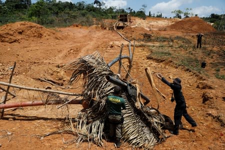 Machines are destroyed at an illegal gold mine during an operation conducted by agents of the Brazilian Institute for the Environment and Renewable Natural Resources (IBAMA) and Federal Police near the city of Altamira