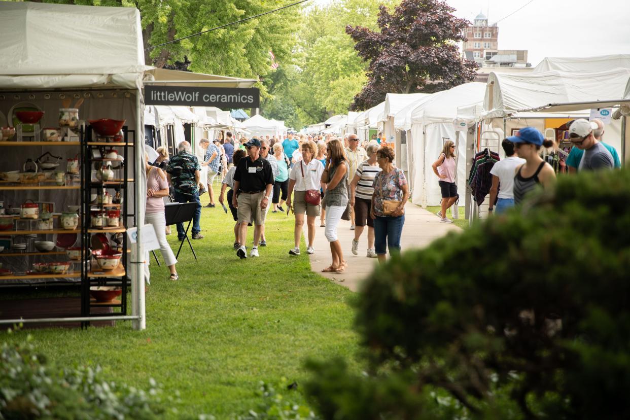 Patrons browse the displays at the 2019 Krasl Art Fair on the Bluff in St. Joseph. The event takes place July 9 and 10, 2022, with an opening block party July 8 at the Krasl in St. Joseph.