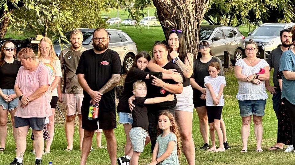 Mourners at a vigil for Vyleen White at Westminster Warriors Soccer Club on Sunday evening.