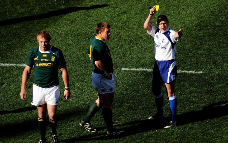 Christophe Berdos shows a yellow card to Schalk Burger - GETTY IMAGES