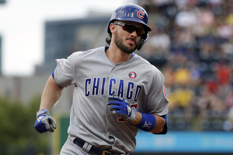 Chicago Cubs' Kris Bryant rounds third after hitting a solo home run off Pittsburgh Pirates starting pitcher Jordan Lyles during the first inning of a baseball game in Pittsburgh, Thursday, July 4, 2019. (AP Photo/Gene J. Puskar)