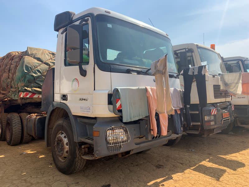 Driver's clothes are hung out to dry on one of the trucks stuck near the sub division office as they wait since last December to cross the border between Cameroon and Central African Republic, in Garoua Boulai