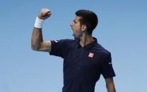 Britain Tennis - Barclays ATP World Tour Finals - O2 Arena, London - 15/11/16 Serbia's Novak Djokovic celebrates winning the first set in his round robin match with Canada's Milos Raonic Reuters / Stefan Wermuth Livepic