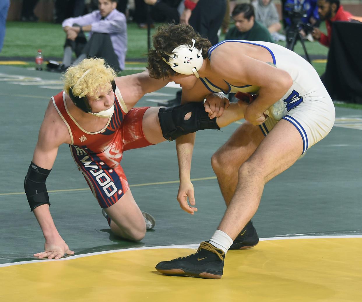 DundeeÕs Blake Cosby pulls back Jonathan Krebs Lakewood inside the circle as he went onto to be the champion at 144-pounds in the State Individual Wrestling Championships at Ford Field in Detroit on Saturday, March 2, 2024.
