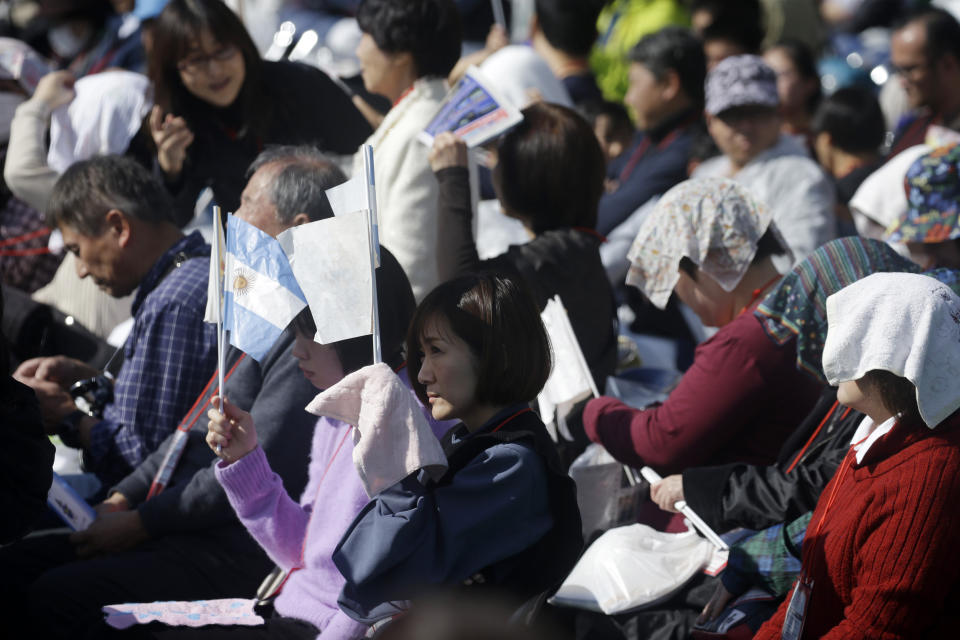 The faithful wait for Pope Francis at Nagasaki Prefectural Baseball Stadium, Sunday, Nov. 24, 2019, in Nagasaki, Japan. (AP Photo/Kiichiro Sato)