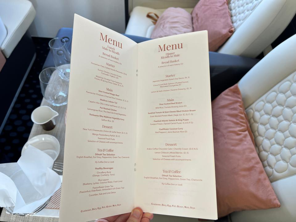 The menu for Beond's Riyadh to Male routes is white with an orange font, and lists Starter, Main, Dessert, and Tea & Coffee
