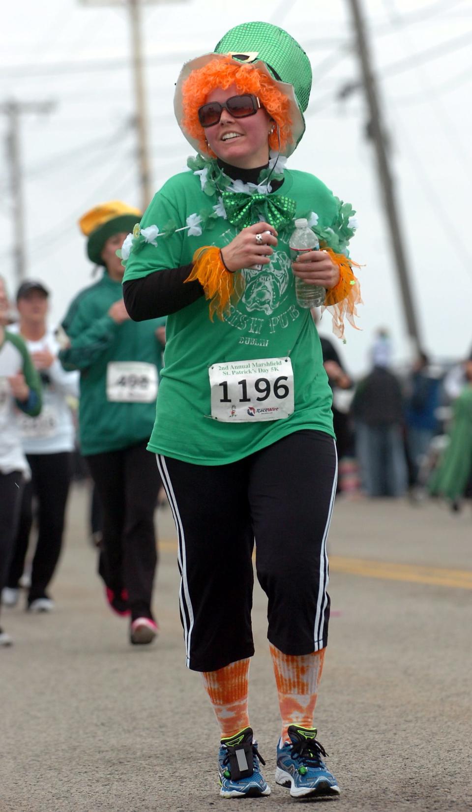 Participants run the second annual St. Patrick's Day 5-K road race in Marshfield, Saturday, March 17, 2012.

photo: Amelia Kunhardt/The Patriot Ledger