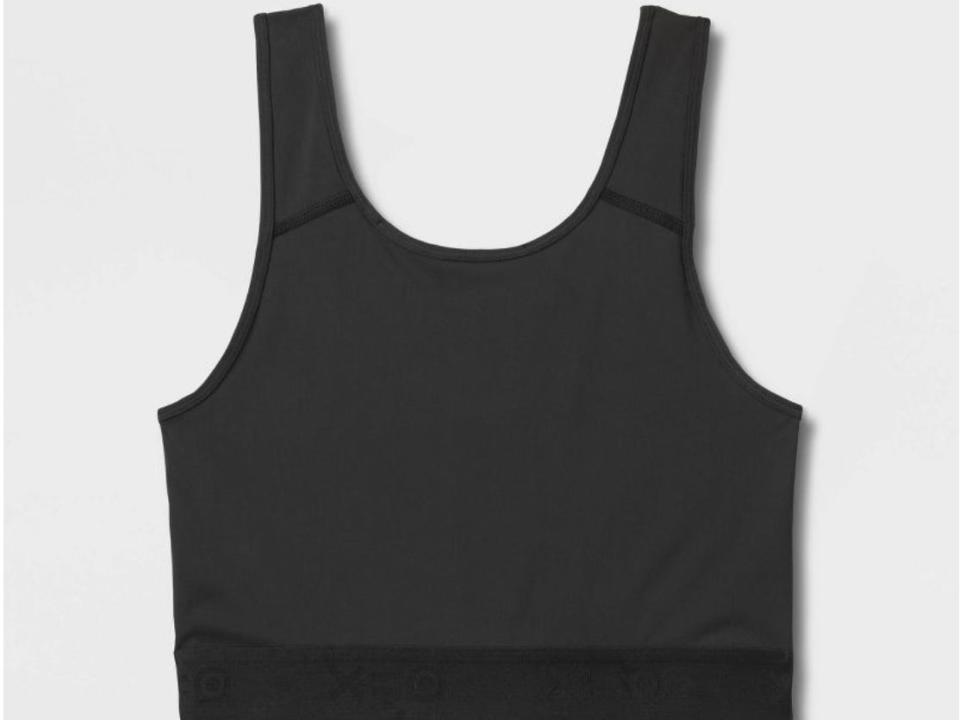 A black sports bra/compression top on a white background.