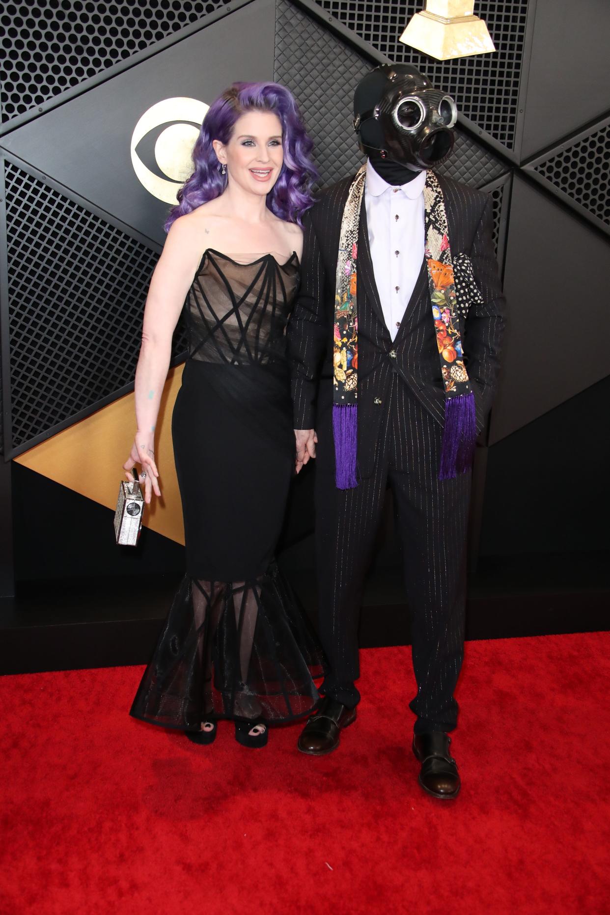 Kelly Osbourne, who has made headlines for controversial comments about Ozempic, pictured with fiancé Sid Wilson of Slipknot.
