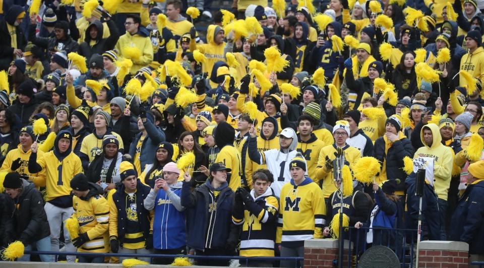 Michigan Wolverines fans cheer on their team before action against the Ohio State Buckeyes, Saturday, Nov. 27, 2021, Michigan Stadium.