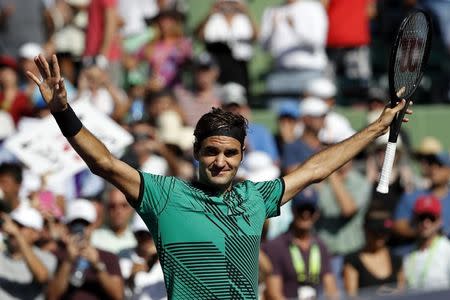 Mar 27, 2017; Miami, FL, USA; Roger Federer of Switzerland celebrates after winning match point against Juan Martin del Potro of Argentina (not pictured) on day seven of the 2017 Miami Open at Crandon Park Tennis Center. Federer won 6-3, 6-4. Mandatory Credit: Geoff Burke-USA TODAY Sports