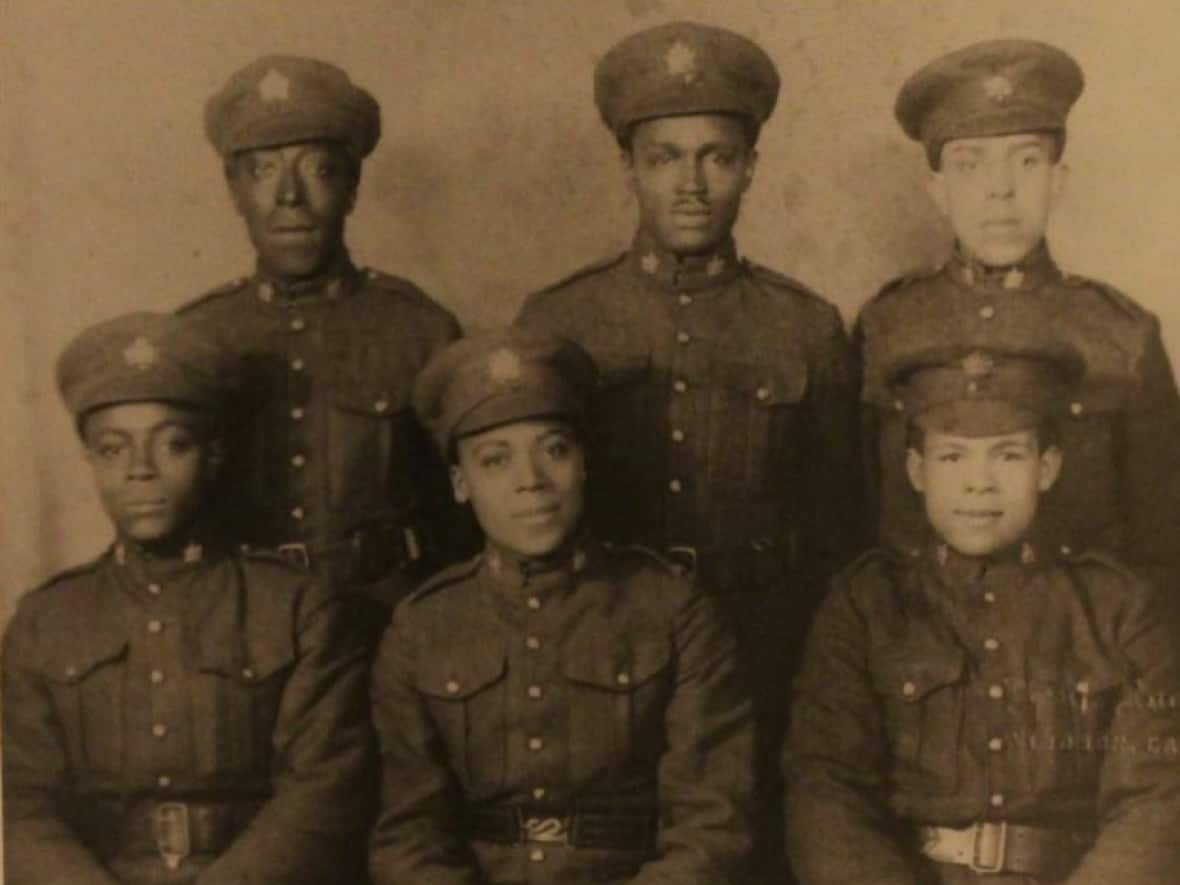 The identities and stories of the six men in this photograph shot in London, Ont., in 1918 are included on the Black Canadian Veterans Stories website. The men were deployed to France and England shortly after the photo was taken.  (Black Canadian Veterans - image credit)