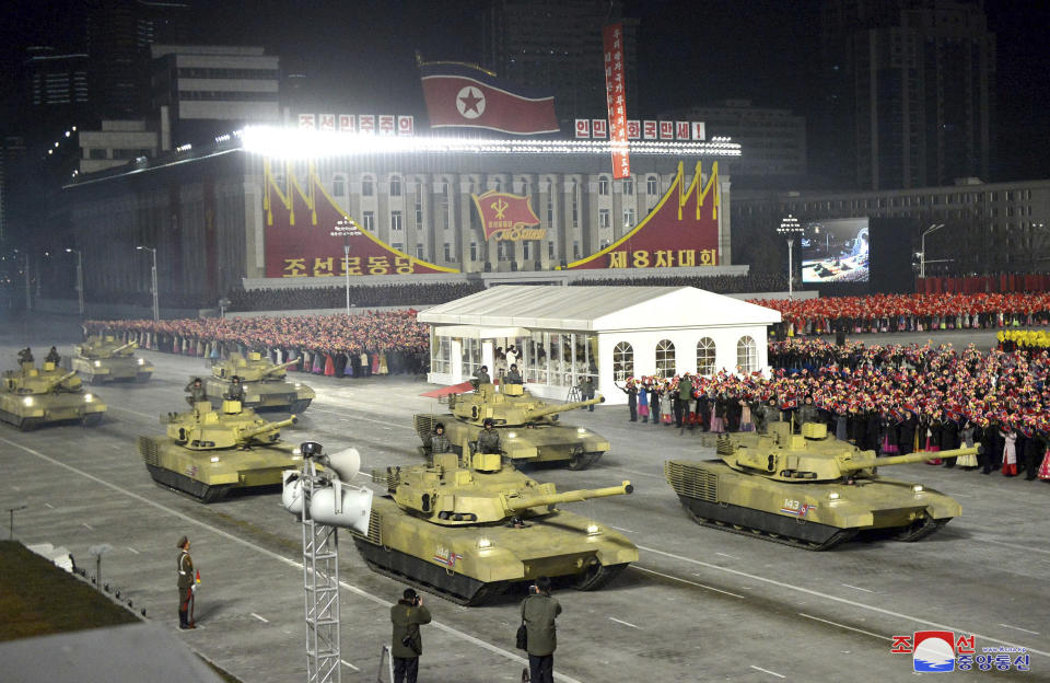 In this photo provided by the North Korean government, a tank unit parades during a military parade marking the ruling party congress, at Kim Il Sung Square in Pyongyang, North Korea Thursday, Jan. 14, 2021. North Korea rolled out developmental ballistic missiles designed to be launched from submarines and other military hardware in a parade that punctuated leader Kim Jong Un’s defiant calls to expand his nuclear weapons program. Independent journalists were not given access to cover the event depicted in this image distributed by the North Korean government. The content of this image is as provided and cannot be independently verified. Korean language watermark on image as provided by source reads: "KCNA" which is the abbreviation for Korean Central News Agency. (Korean Central News Agency/Korea News Service via AP)