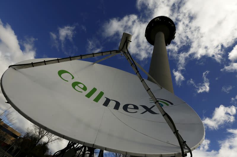FILE PHOTO: A telecom antenna of Spain's telecoms infrastructures firm Cellnex are seen under main telecom tower, known as "Piruli", in Madrid
