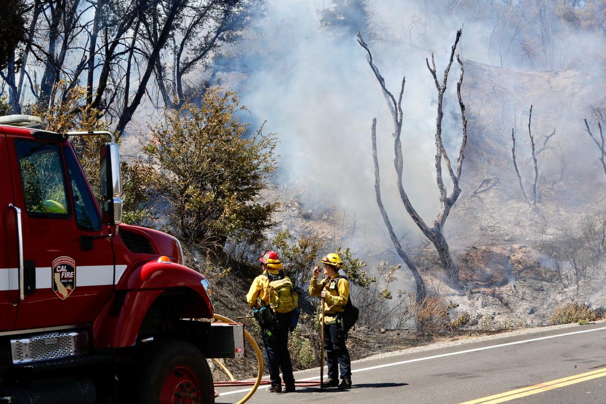 The Kennedy Fire, which broke out about noon Thursday after a head-on collision on Highway 299, ignited nearby grass and burned about 45 acres near Whiskeytown Lake.