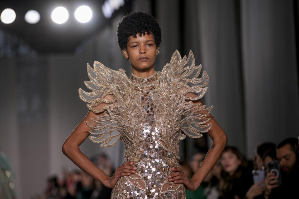 A model wears a creation as part of the Elie Saab Haute Couture Spring-Summer 2023 collection presented in Paris, Wednesday, Jan. 25, 2023. (AP Photo/Christophe Ena)