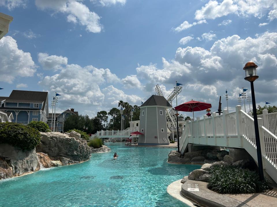 View of pool at Disney yacht club with faux windmill next to it