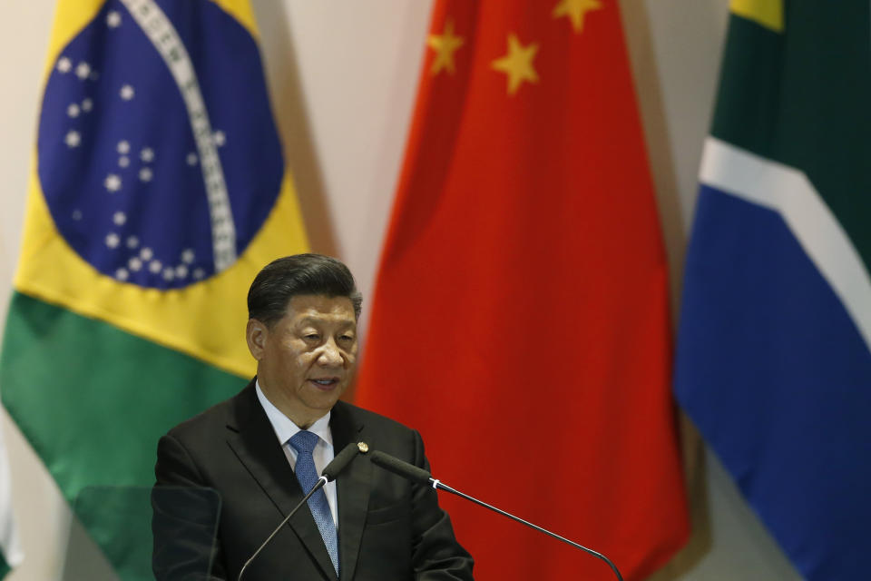 China's President Xi Jinping speaks during the Leaders Dialogue with BRICS Business Council and the New Development Bank, at the Itamaraty Palace in Brasilia, Brazil, Thursday, Nov. 14, 2019. (AP Photo /Eraldo Peres)