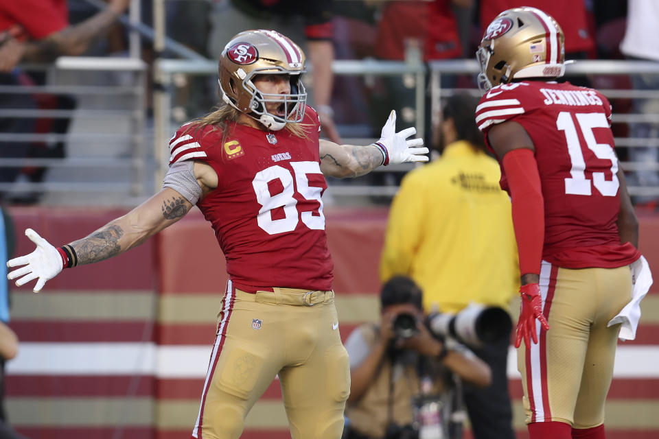 San Francisco 49ers tight end George Kittle (85) celebrates after catching a touchdown pass with wide receiver Jauan Jennings (15) during the first half of an NFL football game against the Dallas Cowboys in Santa Clara, Calif., Sunday, Oct. 8, 2023. (AP Photo/Jed Jacobsohn)