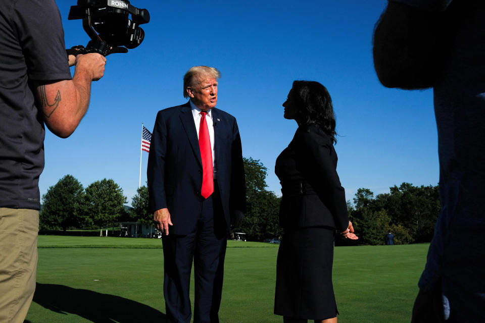 Former President Donald Trump speaks to Kristen Welker on the grass at Trump’s golf club in New Jersey.