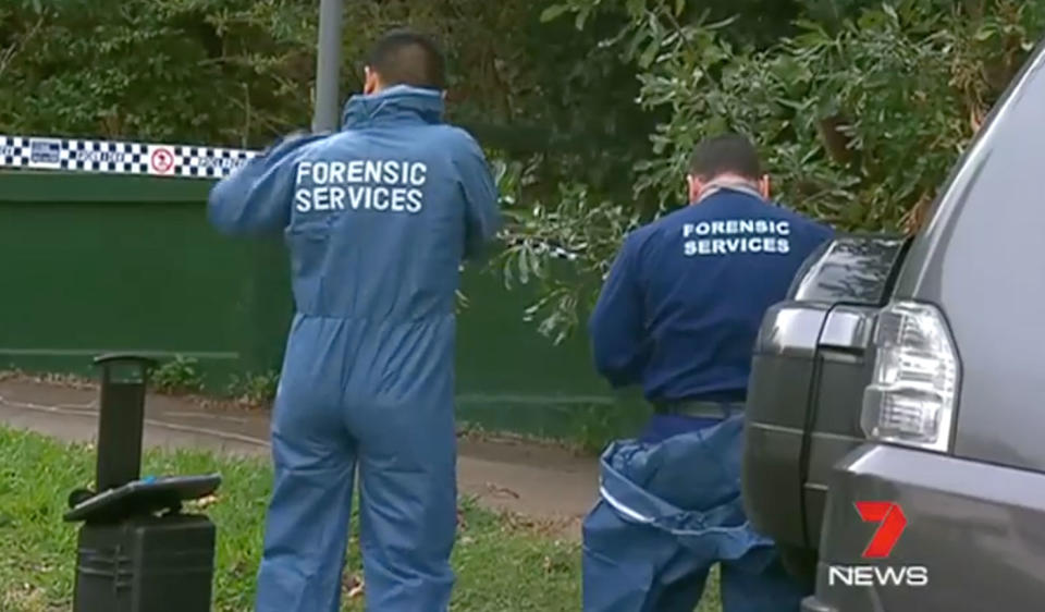 Detectives investigate at the scene. Source: 7 News