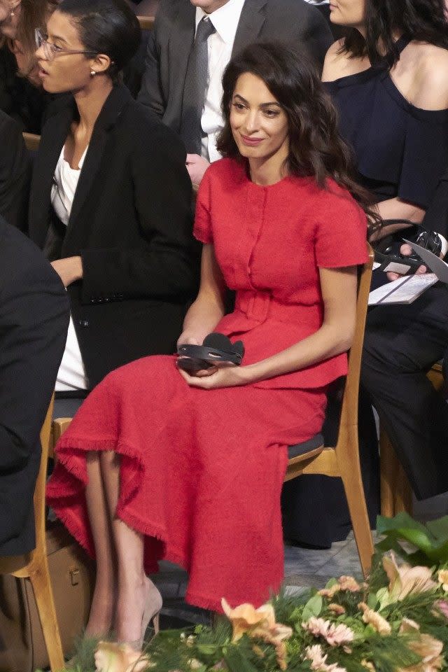 The human rights lawyer was a beauty in a red top-and-skirt set while attending the Nobel Peace Prize ceremony in Norway.