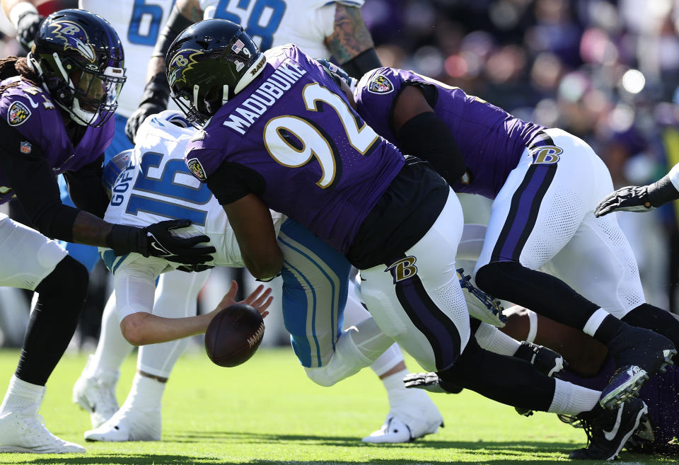 BALTIMORE, MARYLAND – OCTOBER 22: Jared Goff #16 of the Detroit Lions loses the ball as he is sacked by Justin Madubuike #92 of the Baltimore Ravens in the first quarter of the game at M&T Bank Stadium on October 22, 2023 in Baltimore, Maryland. (Photo by Patrick Smith/Getty Images)