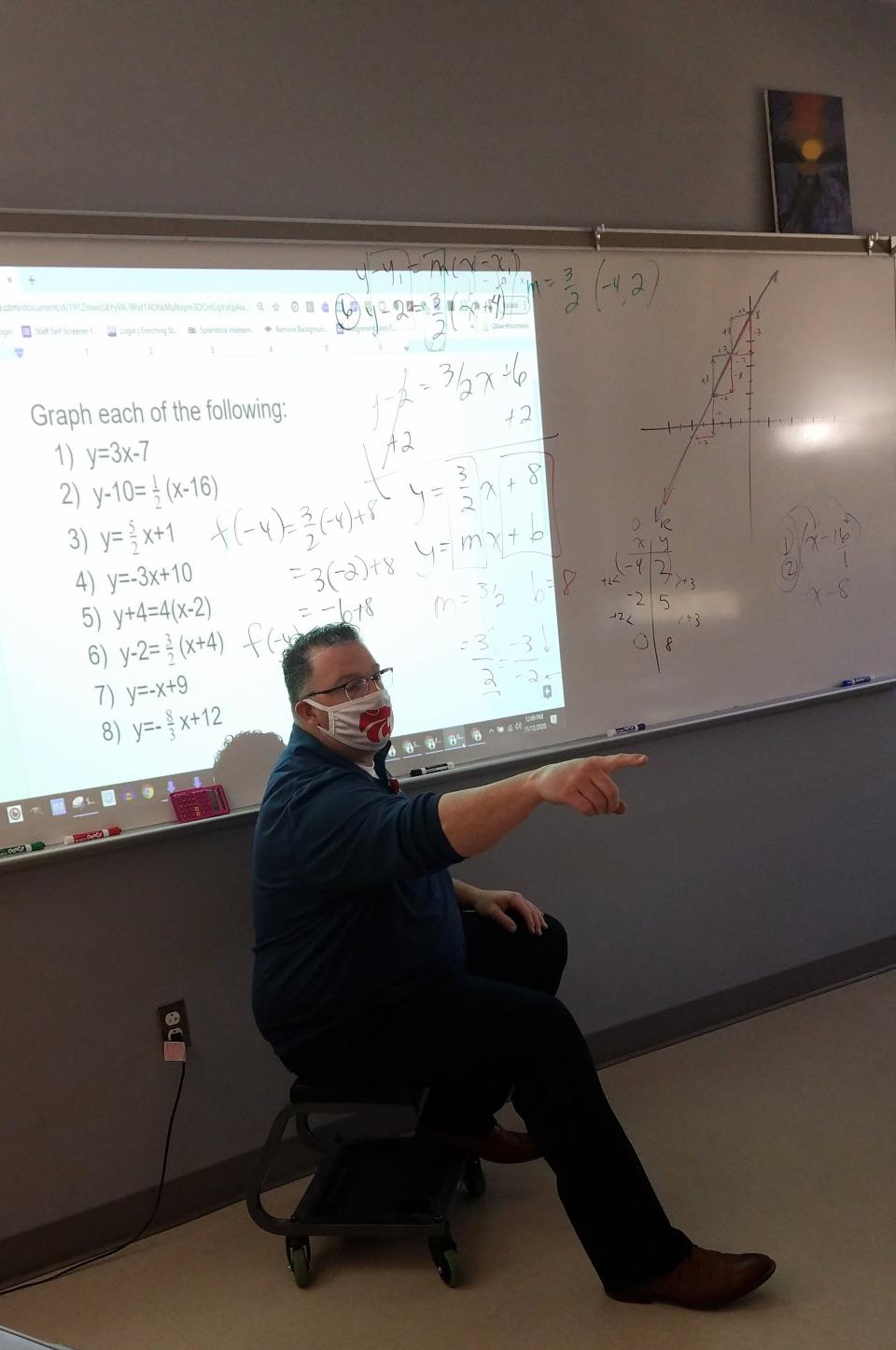 Math teacher Aaron Tomhave leads an in-person class at Splendora High School in Texas on Nov. 12, 2020.