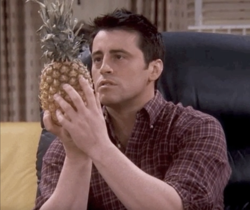 Joey from "Friends" gazes lovingly at a pineapple