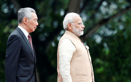 India’s Prime Minister Narendra Modi attends a welcome ceremony with Singapore’s Prime Minister Lee Hsien Loong at the Istana in Singapore June 1, 2018. REUTERS/Edgar Su