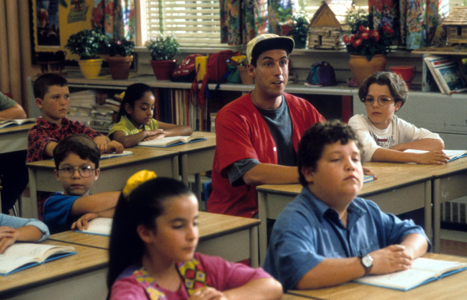 Adam Sandler sitting at a desk in a class for children in a scene from the film 'Billy Madison', 1995. (Photo by Universal Pictures/Getty Images)