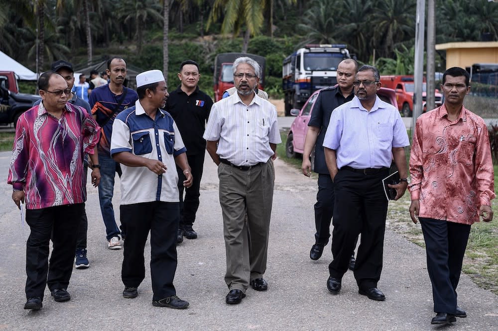 Minister in the Prime Minister’s Department P. Waytha Moorthy visits the ‘red zone’ in Kuala Koh, Gua Musang June 13, 2019. — Bernama pic