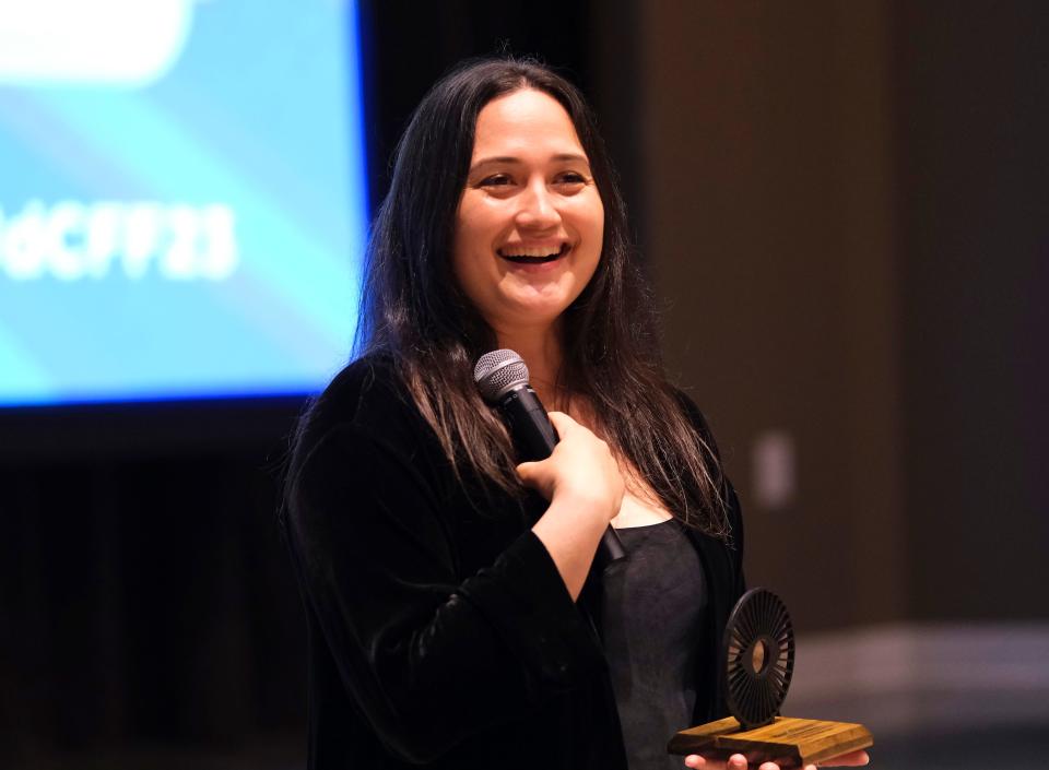 Lily Gladstone, star of "Fancy Dance," prepares to present the deadCenter Film Icon award to the movie's writer-director Erica Tremblay during the 2023 deadCenter Film Festival closing-night screening of "Fancy Dance" at the First Americans Museum in Oklahoma City, Sunday, June 11, 2023.