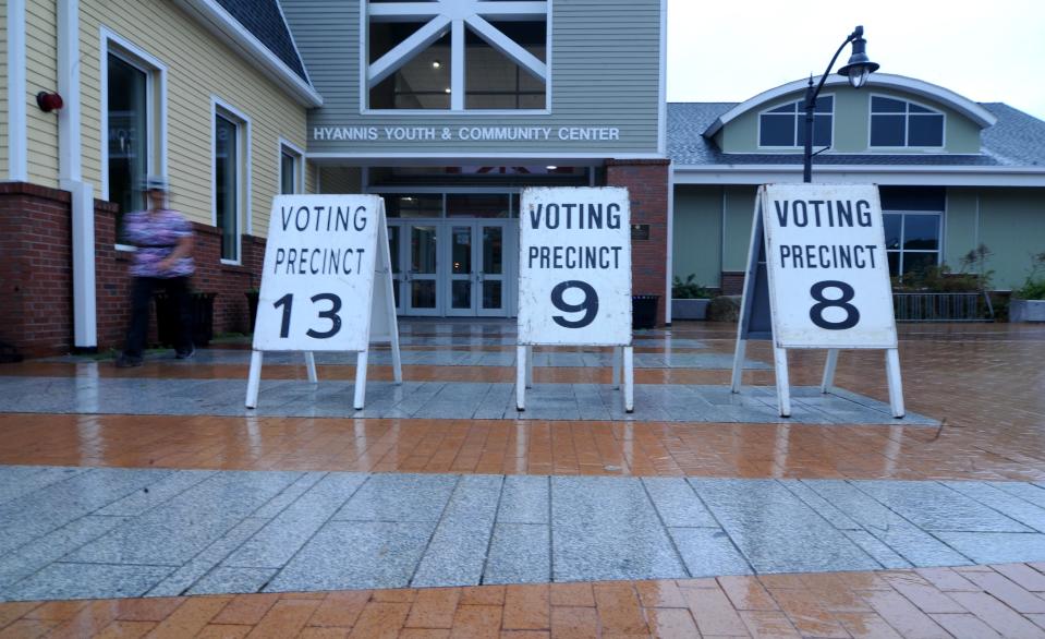 A voter exits the Hyannis Youth & Community Center Tuesday morning in Hyannis after being told ballots were still locked in a vault at Barnstable Town Hall.