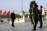 Russian President Vladimir Putin attends a wreath laying ceremony at the Monument to the People's Heroes in Tiananmen Square in Beijing, China, on Thursday, May 16, 2024. (Sergei Bobylev, Sputnik, Kremlin Pool Photo via AP)