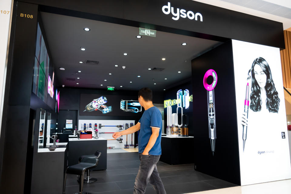 SHENZHEN, GUANGDONG, CHINA - 2019/10/05: Pedestrian walk past a British technology company Dyson store in Shenzhen. (Photo by Alex Tai/SOPA Images/LightRocket via Getty Images)