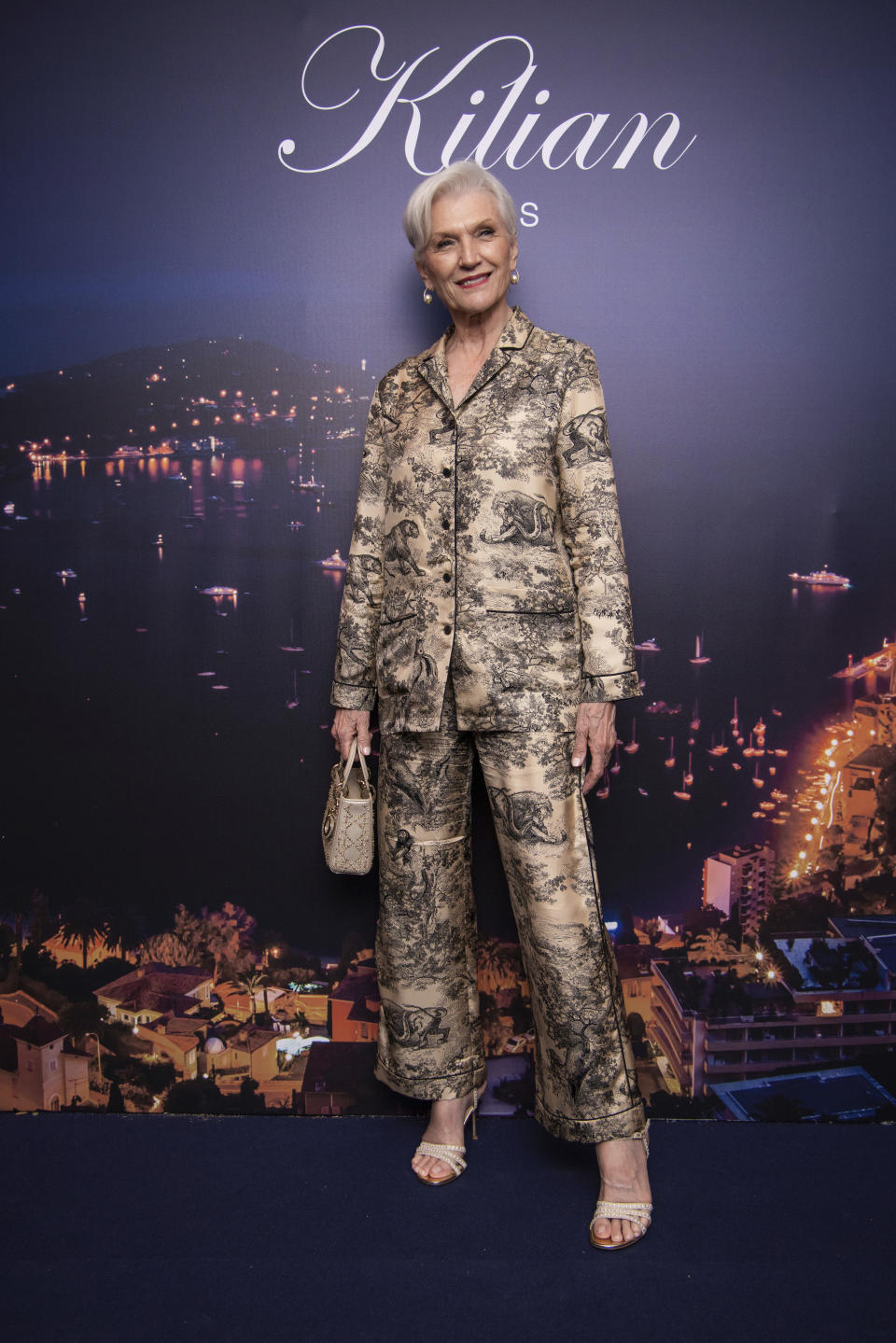 Maye Musk poses for photographers upon arrival at the Killian Paris Kool Yacht Party on May 27. - Credit: Vianney Le Caer/Invision/AP