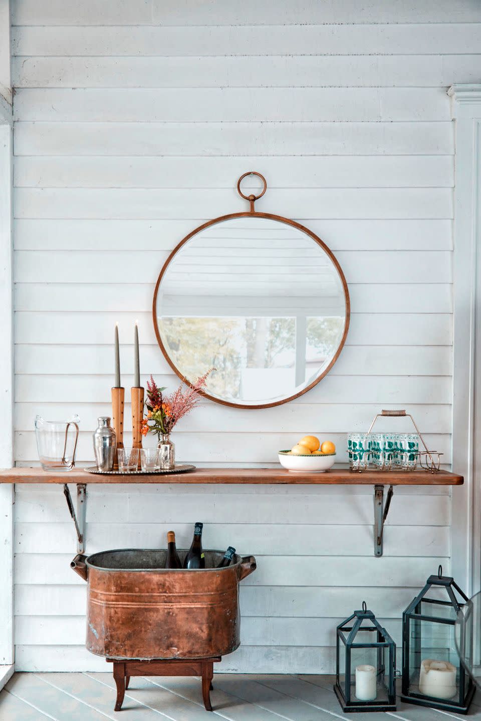 <p>Up for a DIY? Install a wooden shelf right on your porch, and you'll have an instant serving station. <br></p>