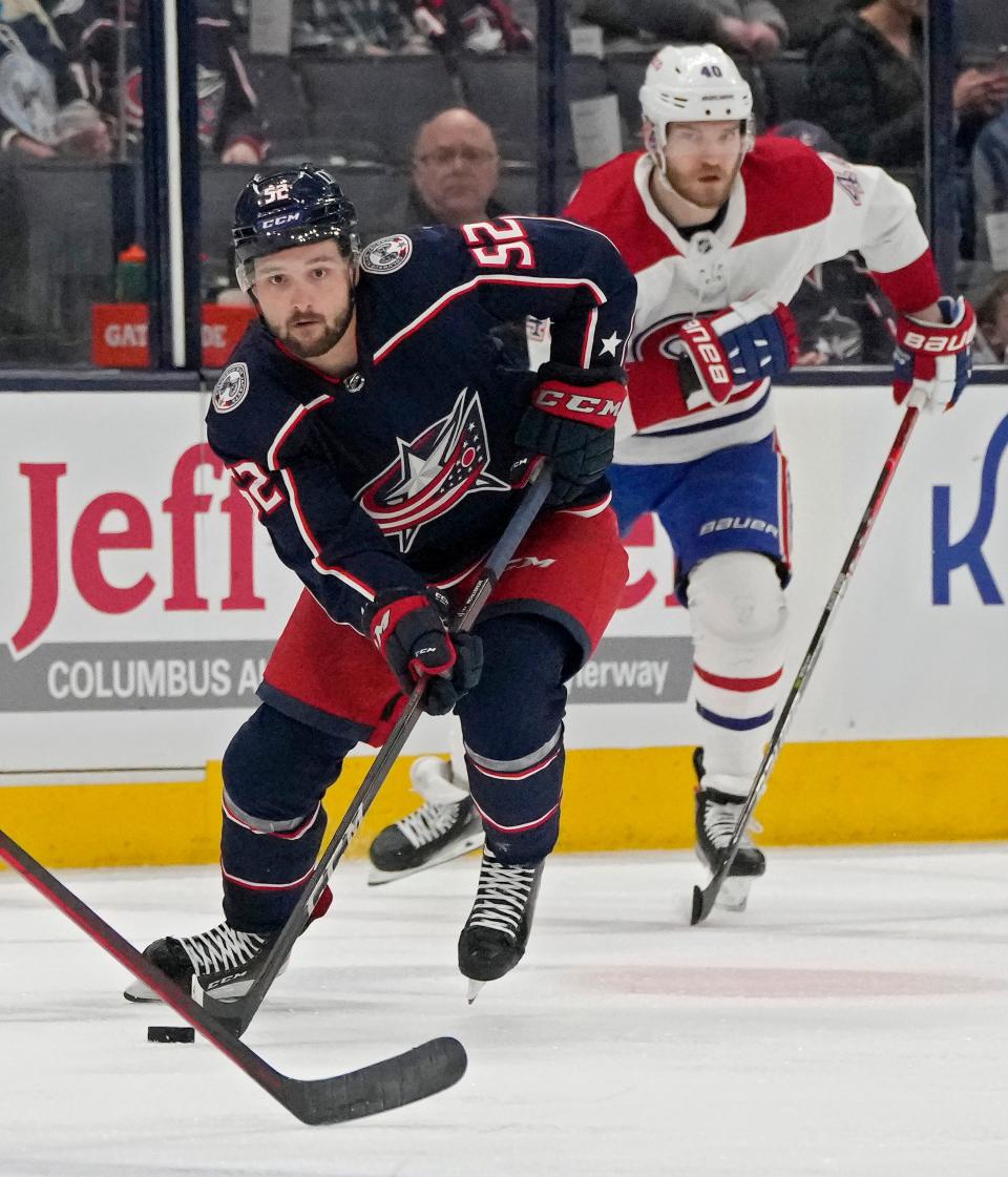 Apr 13, 2022; Columbus, Ohio, USA; Columbus Blue Jackets center Emil Bemstrom (52) gets by Montreal Canadiens right wing Joel Armia (40) during Wednesday's NHL game at Nationwide Arena. Mandatory Credit: Barbara Perenic/Columbus Dispatch