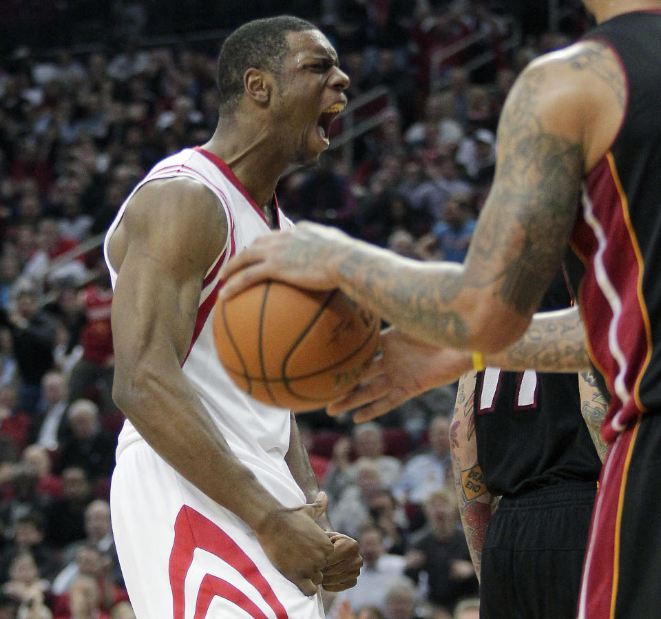 Houston Rockets forward Terrence Jones celebrates after a dunk during the fourth quarter of an NBA basketball game against the Miami Heat, Tuesday, March, 4, 2014, in Houston. The Rockets defeated the Heat 106-103. (AP Photo/Patric Schneider)