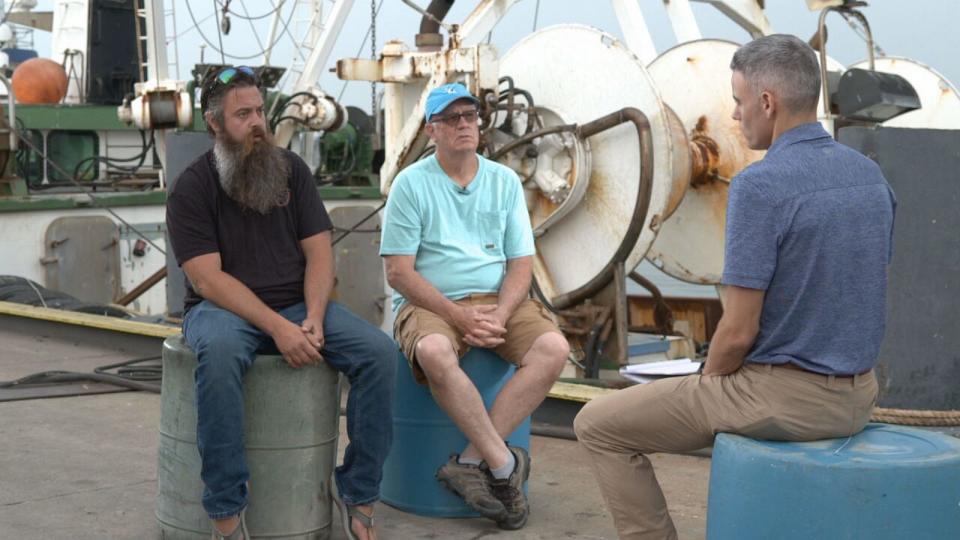 PHOTO: Herring fishermen Stefan Axelsson, left, and Bill Bright, middle, of Cape May, N.J., are asking the U.S. Supreme Court to strike down a rule that would have them pay the salaries of government monitors aboard their vessels. (ABC News)