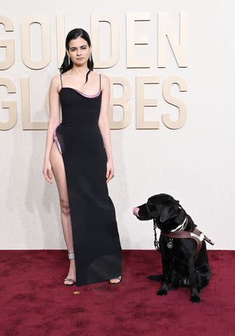 <p>Gilbert Flores/Golden Globes 2024/Golden Globes 2024 via Getty</p> Aria Mia Loberti and her guide dog