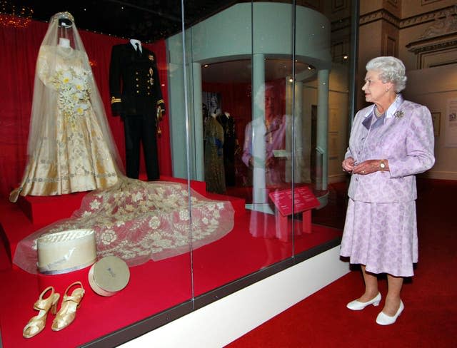 The Queen views her wedding dress