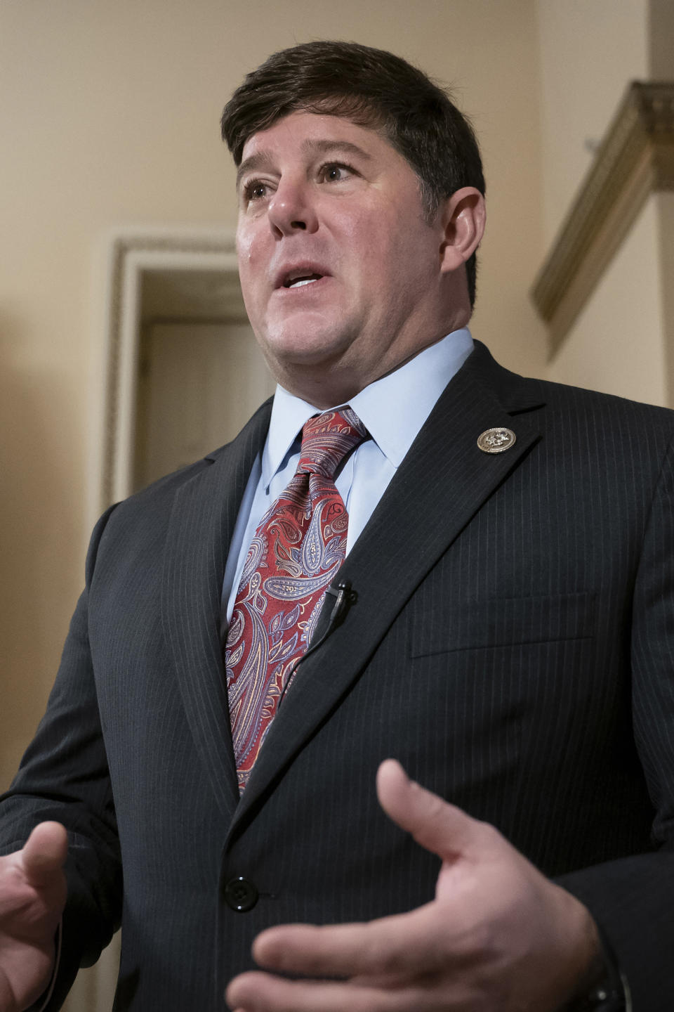 FILE - U.S. Rep. Steven Palazzo, R-Miss., speaks during a television news interview on Capitol Hill in Washington, Feb. 15, 2019. Palazzo faces Jackson County Sheriff Mike Ezell in a runoff for Mississippi's 4th Congressional District Republican nomination. (AP Photo/J. Scott Applewhite, File)