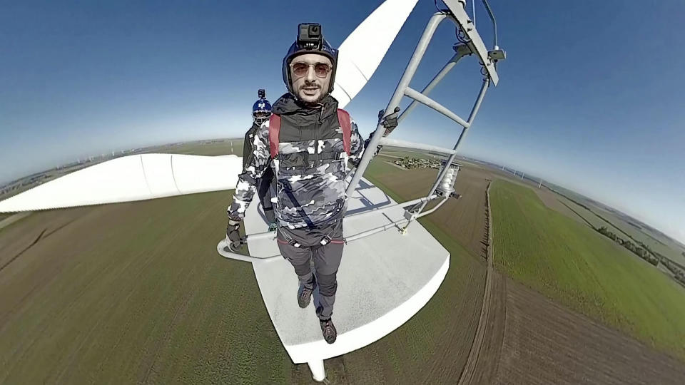 A daring BASE jumper performed a perfect 'low level' stunt from a wind turbine but ended up face-planting the ground after he literally ploughed into a field. Kevin Marret, 28, had a lucky escape - with only his ego bruised - after the less than stellar landing after leaping off the 280ft turbine in the Midi- Pyrenees. The beautiful footage starts out well as Kevin jumps and freefalls for a moment before pulling his shoot. But he opened his chute a fraction of a second too late and, due to excessive forward momentum, ate dirt. Luckily Kevin was uninjured hurt and can see the funny side of the whole affair. Kevin, from Paris, France, said: “I was visiting the location for Base jumping. I performed my chute pull too low, plus it was a bit windy. I need less delay before I pull next time.”