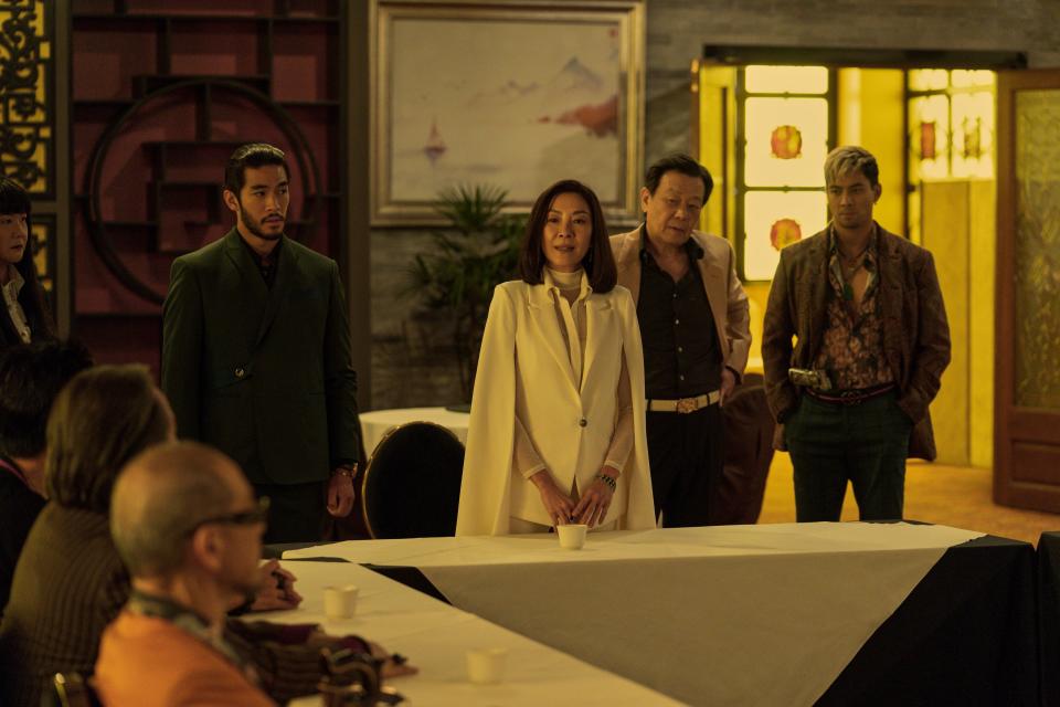 <em>The Brothers Sun</em>. (L to R) Jenny Yang as Xing, Justin Chien as Charles Sun, Michelle Yeoh as Mama Sun, Johnny Kou as Big Sun, Yoshi Sudarso as Lance Wang.