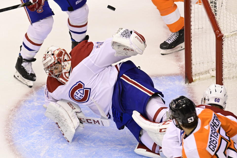 Montreal Canadiens goaltender Carey Price (31) makes save against the Philadelphia Flyers during the second period of an NHL Eastern Conference Stanley Cup hockey playoff game in Toronto, Friday, Aug. 14, 2020. (Frank Gunn/The Canadian Press via AP)