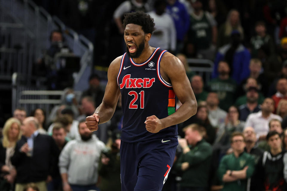 MILWAUKEE, WISCONSIN - FEBRUARY 17: Joel Embiid #21 of the Philadelphia 76ers reacts to an officials call during the second half of a game against the Milwaukee Bucks at Fiserv Forum on February 17, 2022 in Milwaukee, Wisconsin. NOTE TO USER: User expressly acknowledges and agrees that, by downloading and or using this photograph, User is consenting to the terms and conditions of the Getty Images License Agreement. (Photo by Stacy Revere/Getty Images)